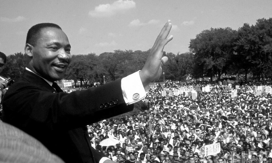 dr-martin-luther-king-jr-voicesfilm-1280-x-853-10-1140×684 Martin Luther King waving to a crowd